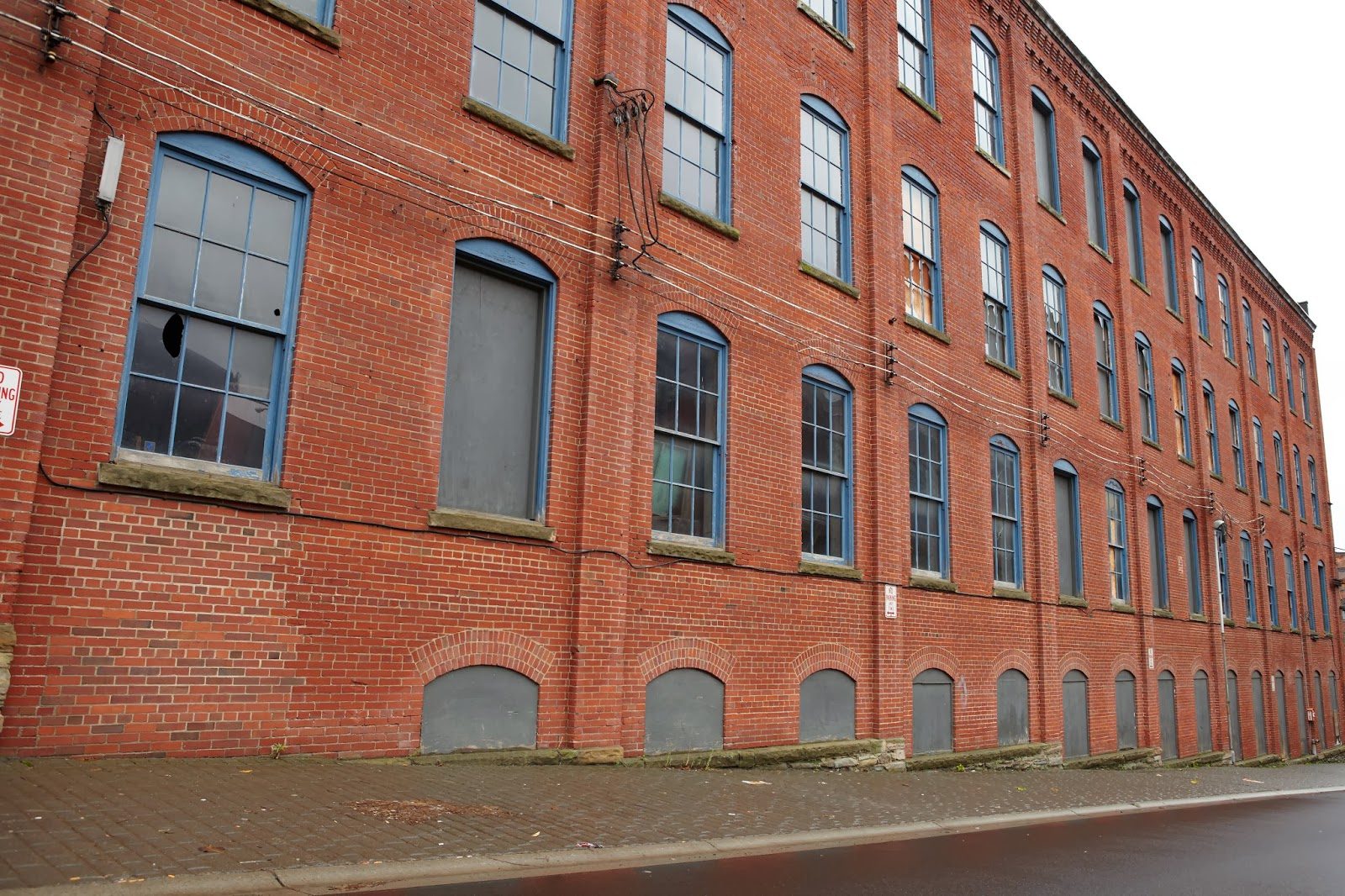 Long brick facade along the street