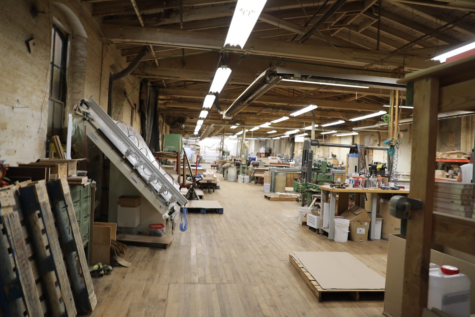Shop aisle lined with machinery